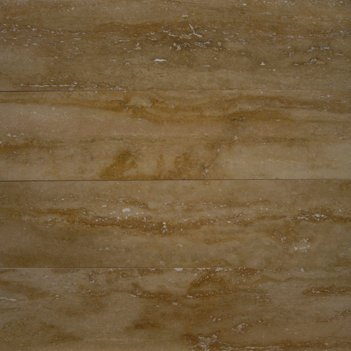 Musterfliese aus travertin scabas antik gold, gespachtelt und geschliffen, zeigt natürliche Textur und elegantes Design.