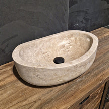 Glattes Aufsatzwaschbecken aus Travertin-Naturstein in verschiedenen Größen, perfekt für moderne Badgestaltung, von WAVE.